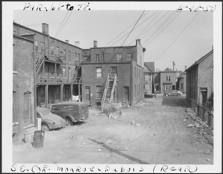 Building at 1030-1058 Dubois and 2208-2214 Monroe