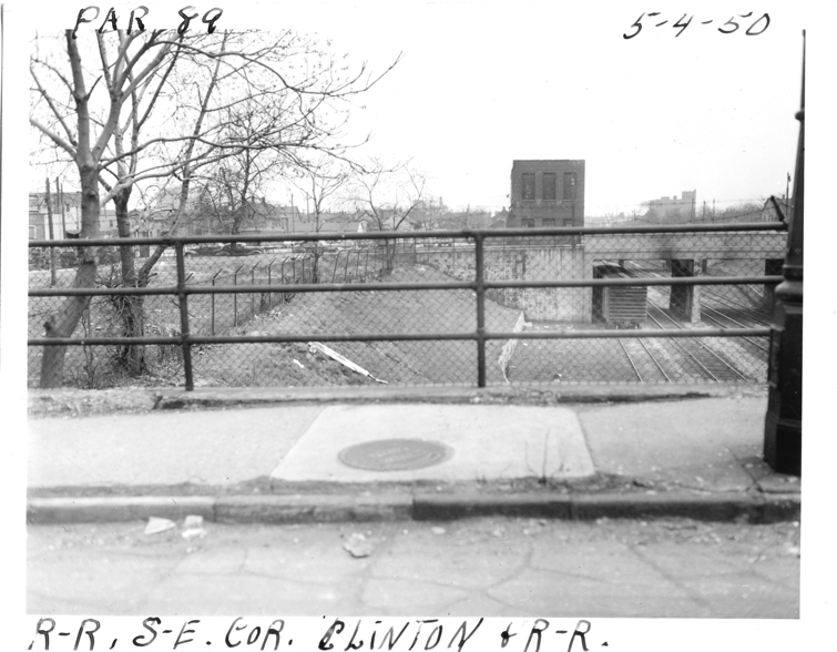 Railroad embankment at southeast corner of Clinton and railroad