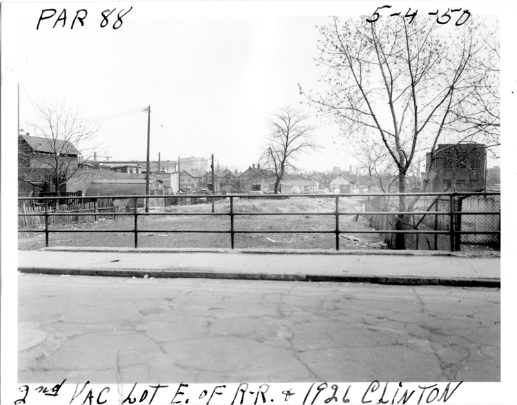 Vacant lot east of railroad and 1926 Clinton