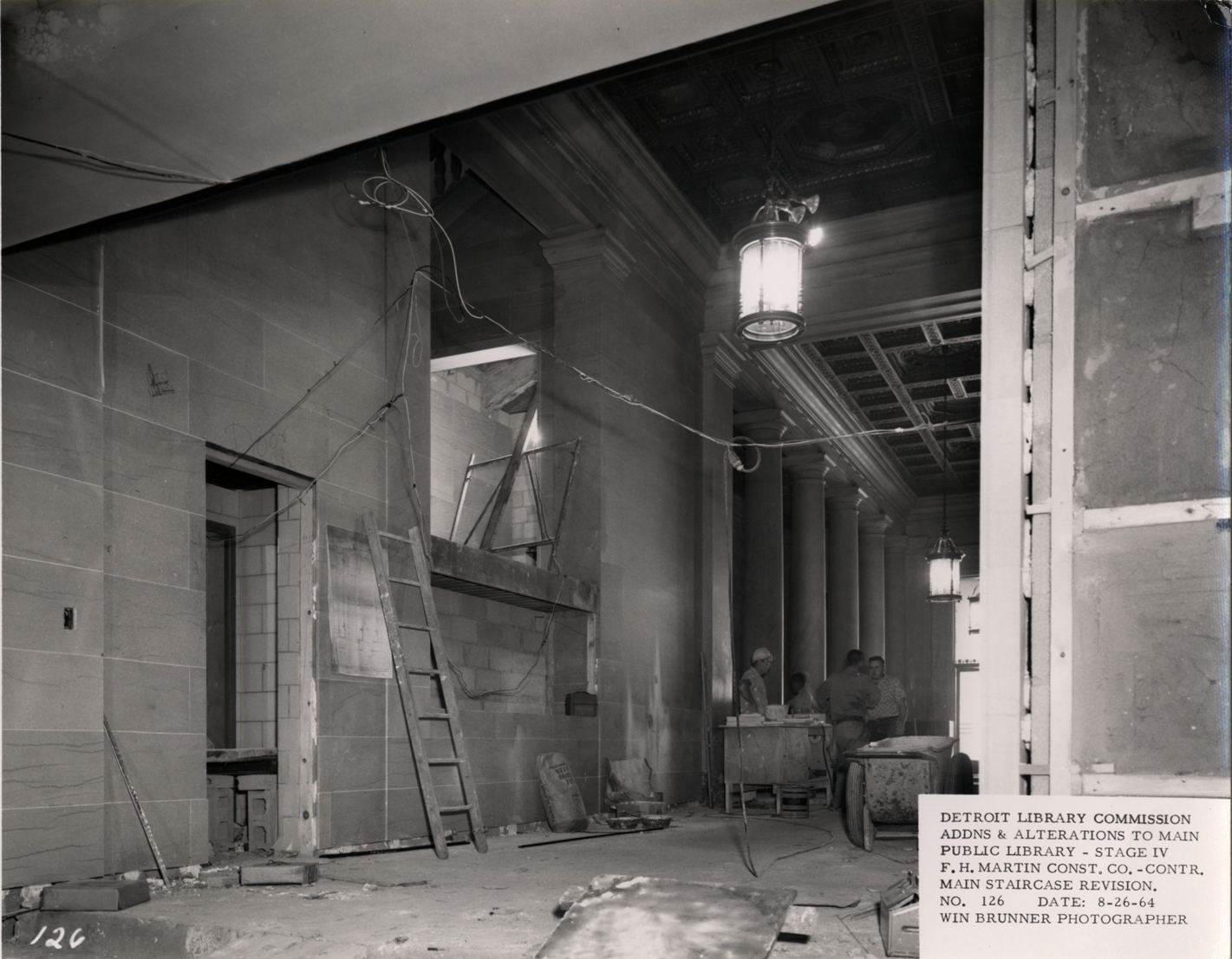 Construction workers in main hallway of Main Library