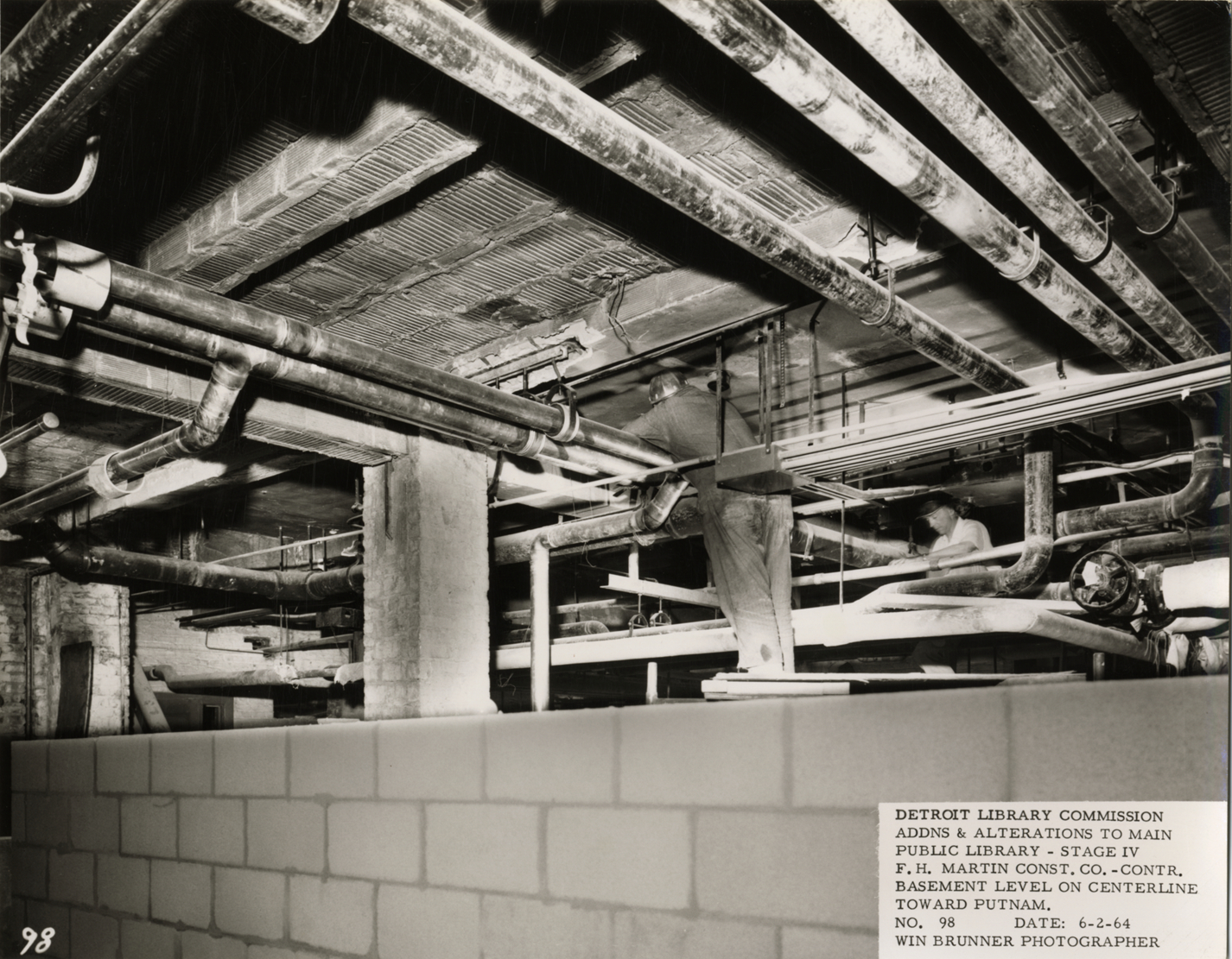 Construction workers in basement, Main Library