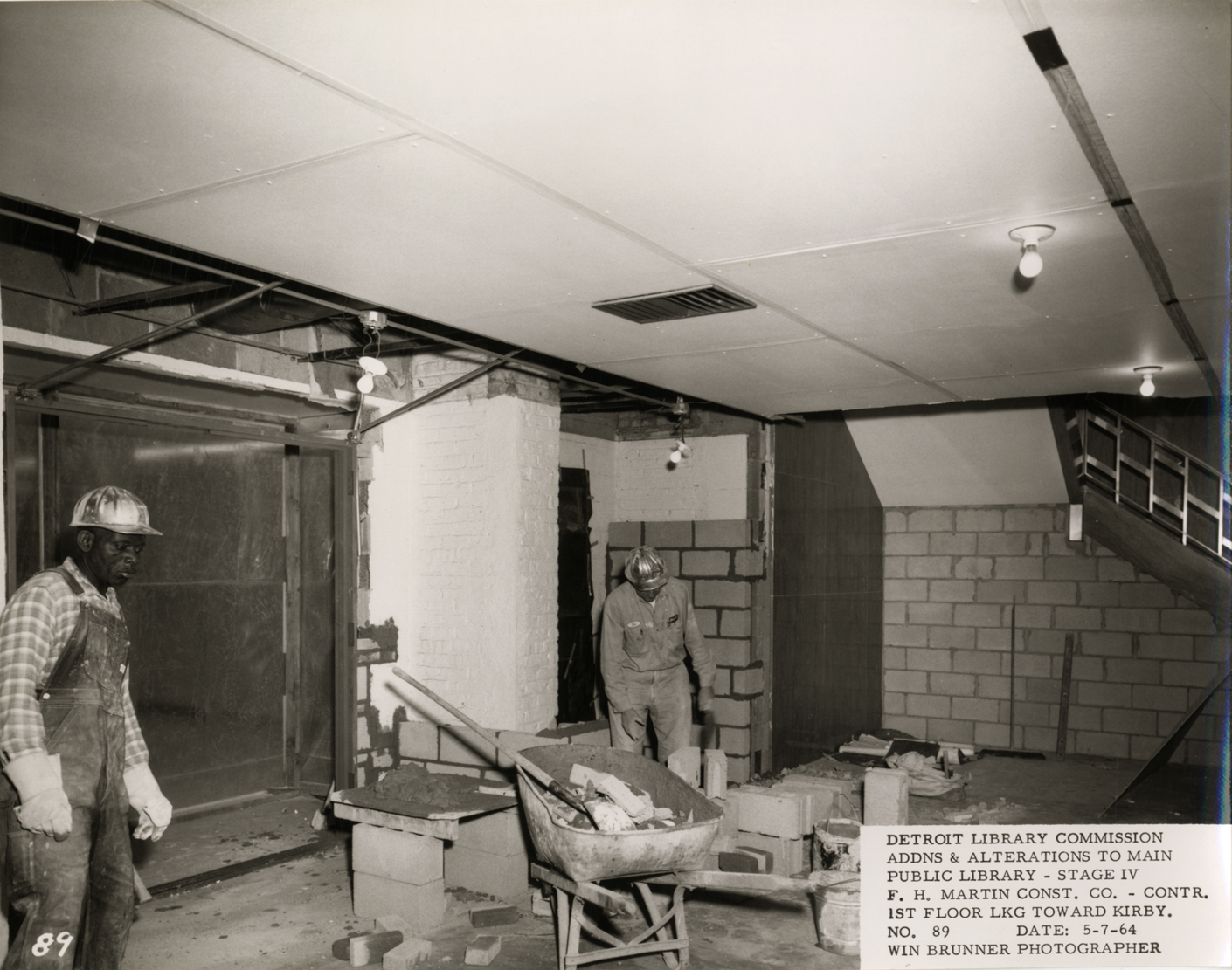 Construction workers on first floor, Main Library