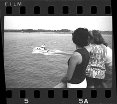 Women watching motorboat from Bob-Lo ferry