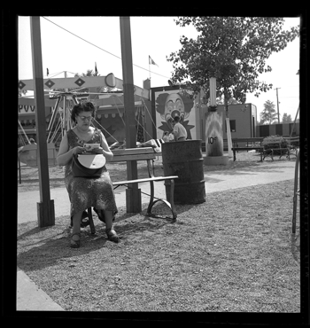Woman reading card, Bob-Lo Amusement Park