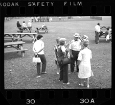 Men and women conversing in picnic area, Bob-Lo Island