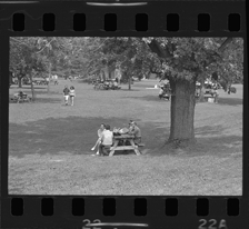 Group at picnic table, Bob-Lo Island