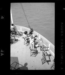 Couple relaxing on deck of Bob-Lo ferry