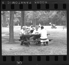 Men sitting at picnic table, Bob-Lo Island