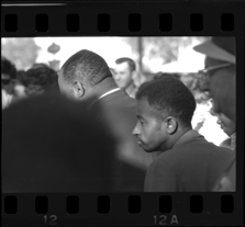 Men in crowd waiting for Bob-Lo ferry