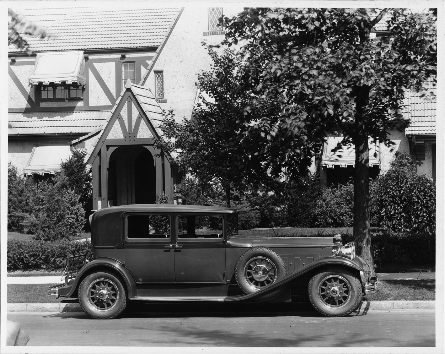 1930 Packard club sedan, right side view, parked on street in front of home  | DPL DAMS