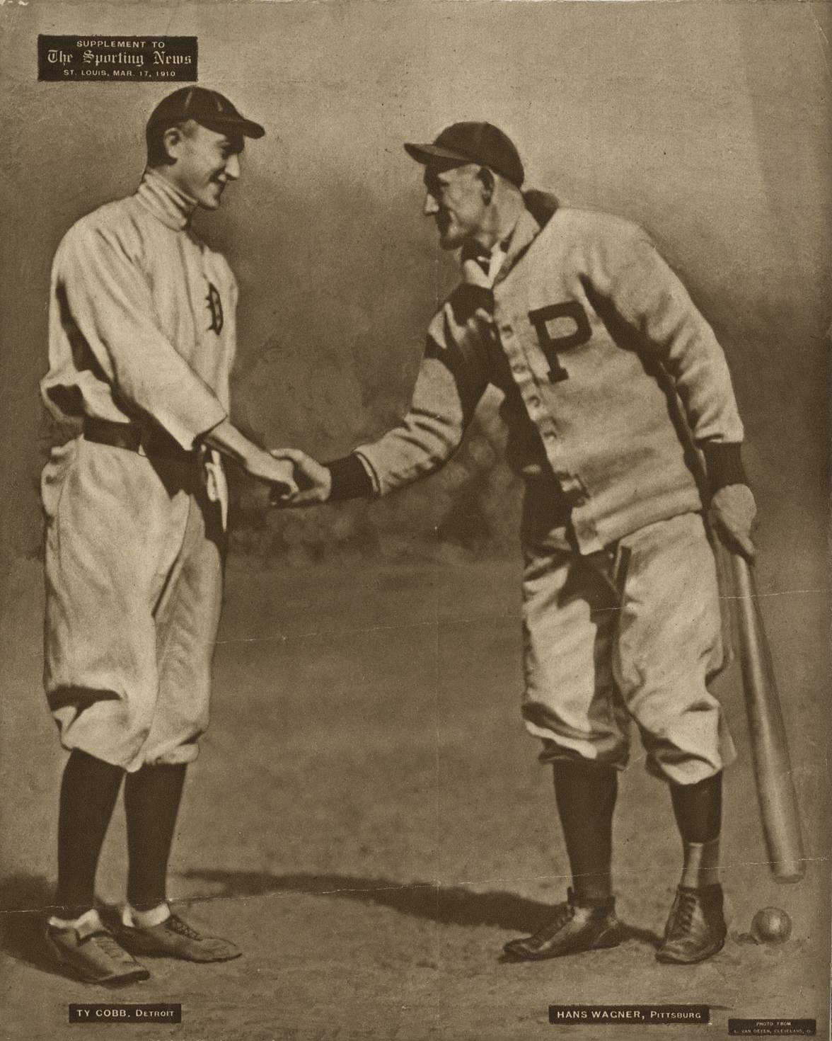 Ty Cobb shaking hands with Honus Wagner