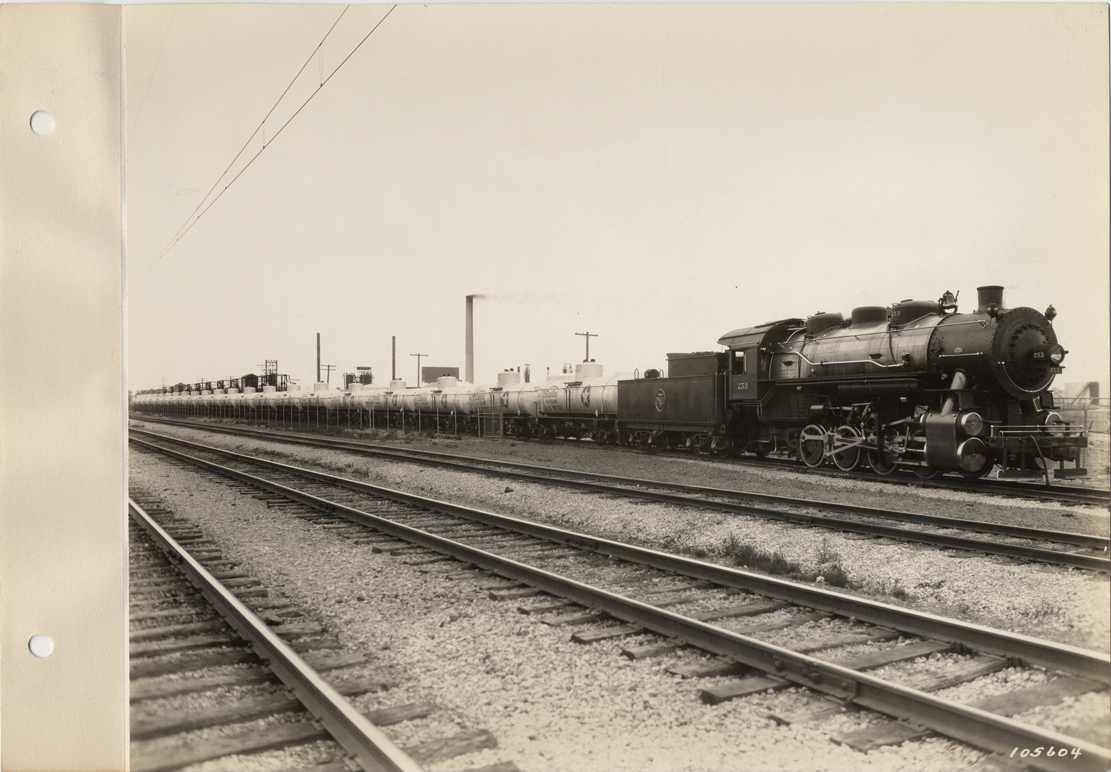 Locomotive and White Star Refining Co. tank cars