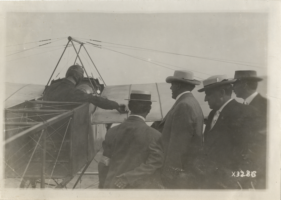 Men and aviator at Detroit aviation meet