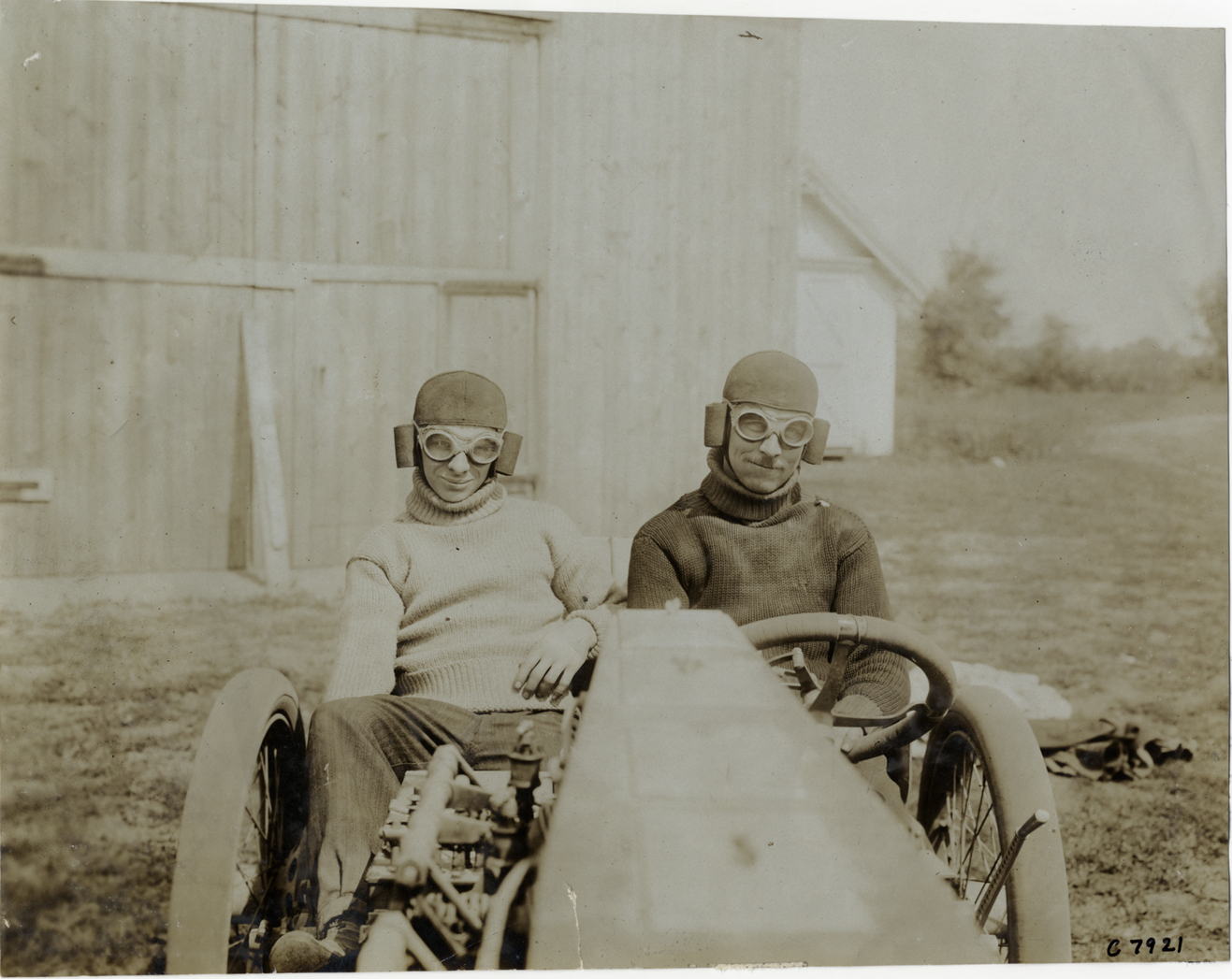 Lee Frayer and passenger in racecar