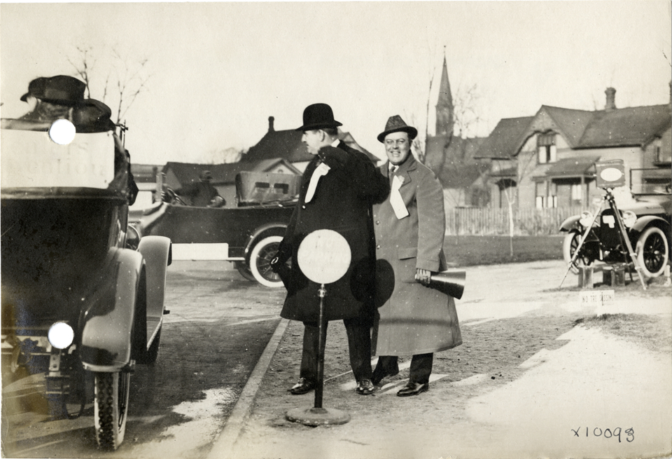 Chalmers dealers standing on sidewalk at convention