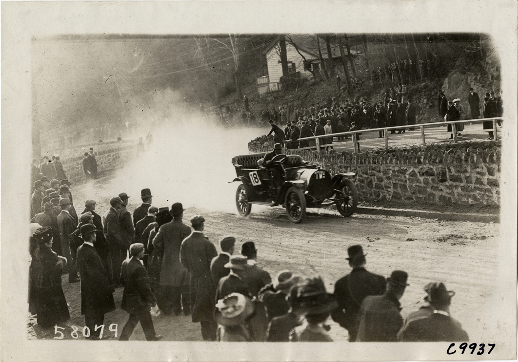 Driver in racecar, 1909 Edgewater-Fort Lee Hill Climb