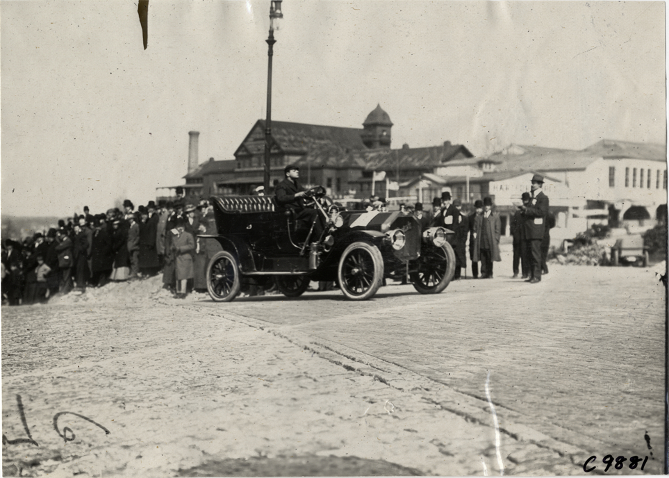 Driver in racecar, 1909 Fort George Hill Climb