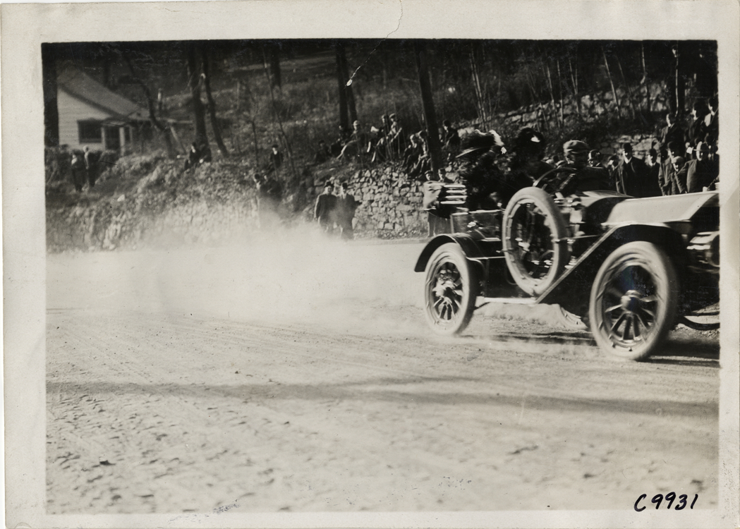 Driver in racecar, 1909 Edgewater-Fort Lee Hill Climb