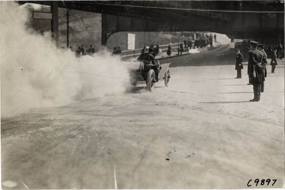 Aiken driving National racecar, 1909 Fort George Hill Climb