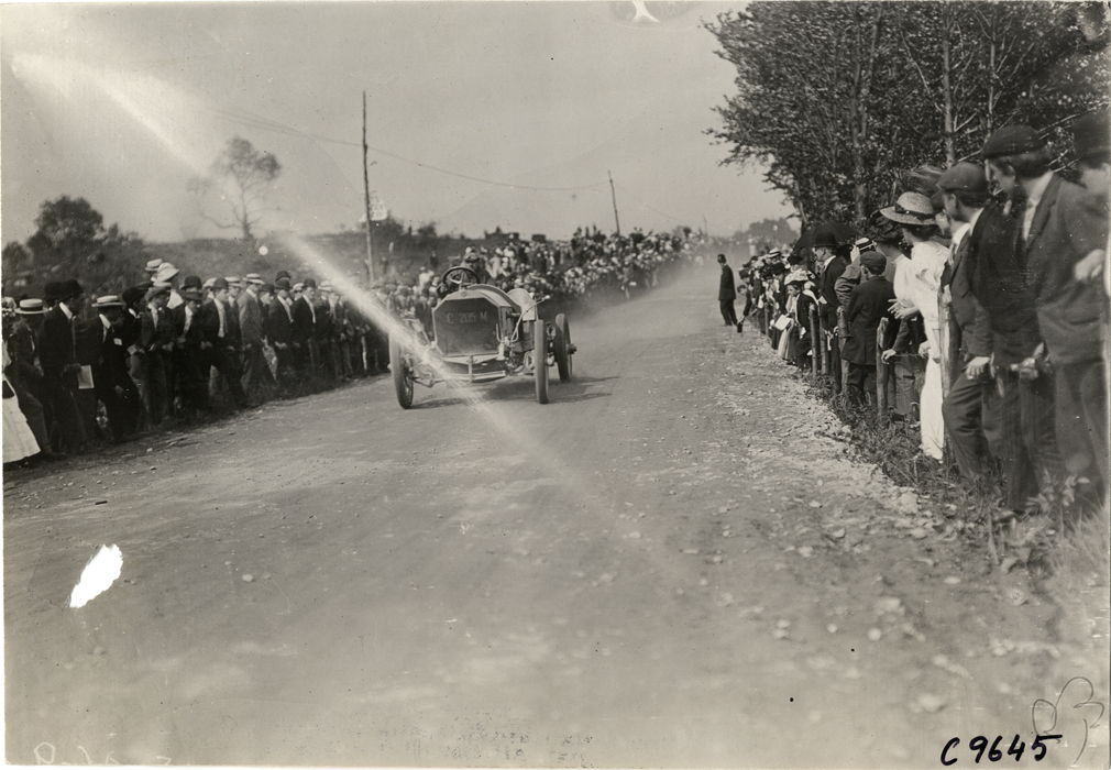 Driver in racecar, 1909 Dead Horse Hill Climb