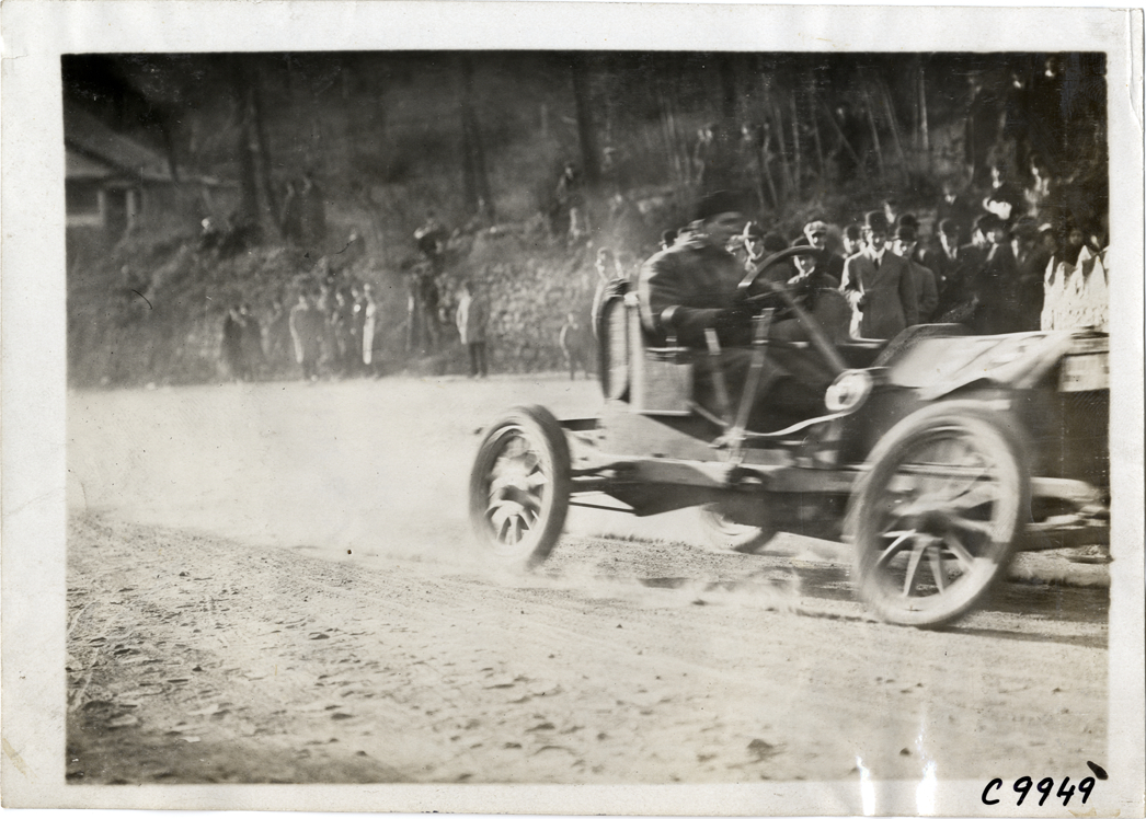 Driver in racecar, 1909 Edgewater-Fort Lee Hill Climb
