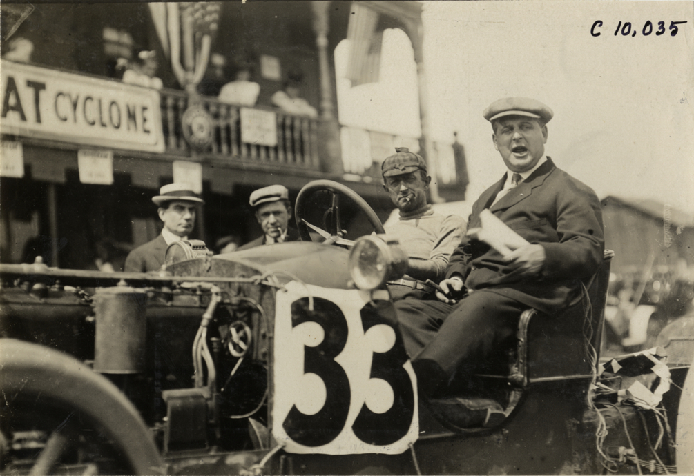 Driver and passenger in racecar, 1909 Giant's Despair Hill Climb