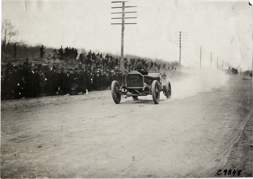 Dennison driving Knox racecar, 1909 Fort George Hill Climb