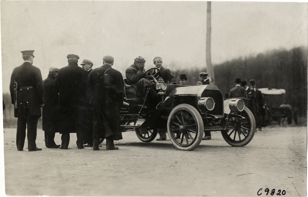 Driver in racecar, 1909 Fort George Hill Climb