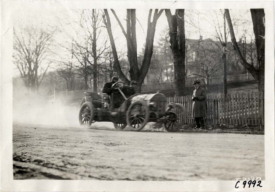 Driver in racecar, 1909 Edgewater-Fort Lee Hill Climb