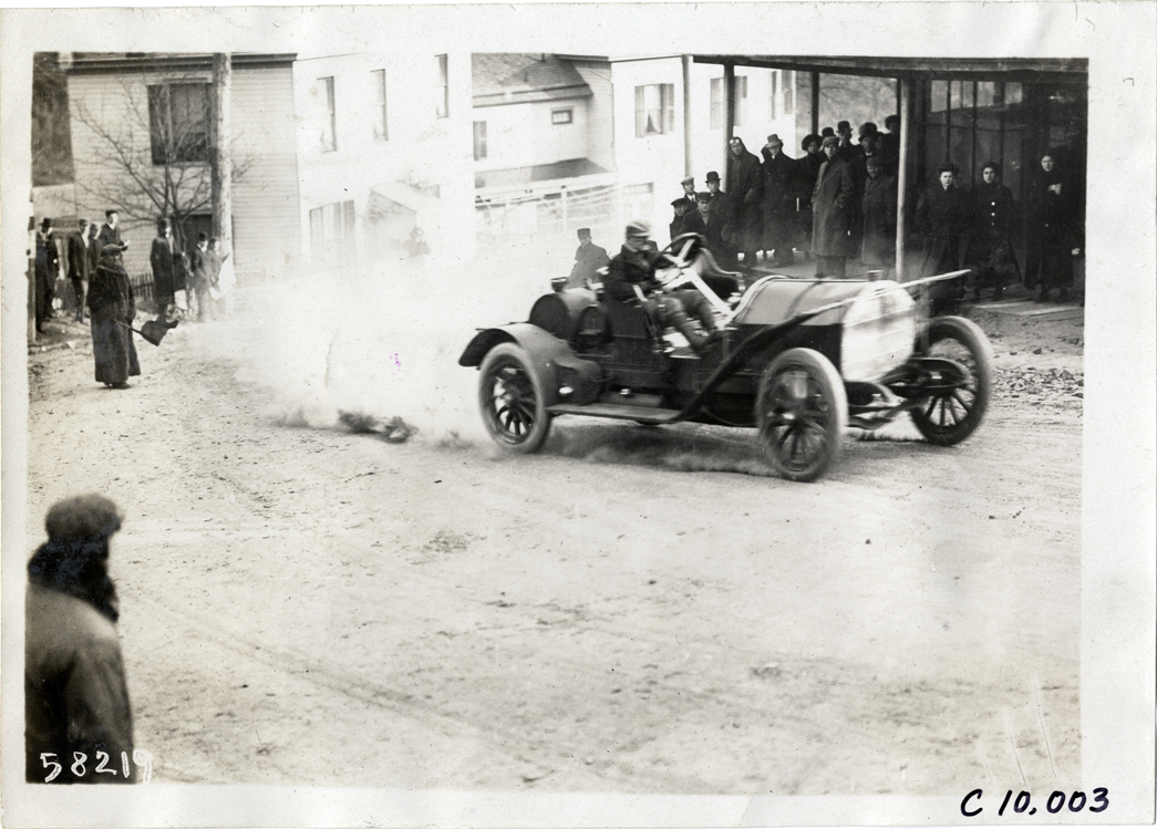 Driver in racecar, 1909 Edgewater-Fort Lee Hill Climb