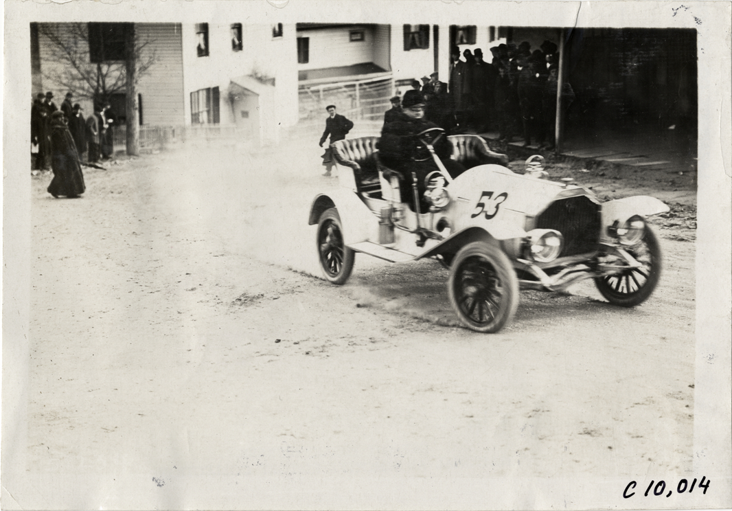 Driver in racecar, 1909 Edgewater-Fort Lee Hill Climb