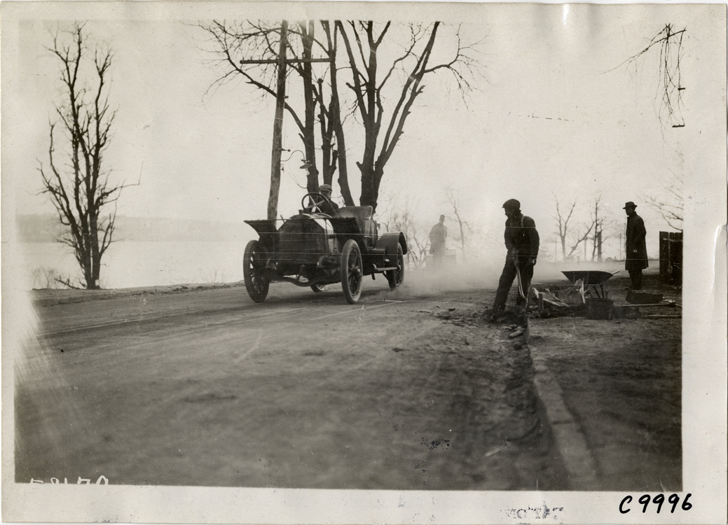 Driver in racecar, 1909 Edgewater-Fort Lee Hill Climb