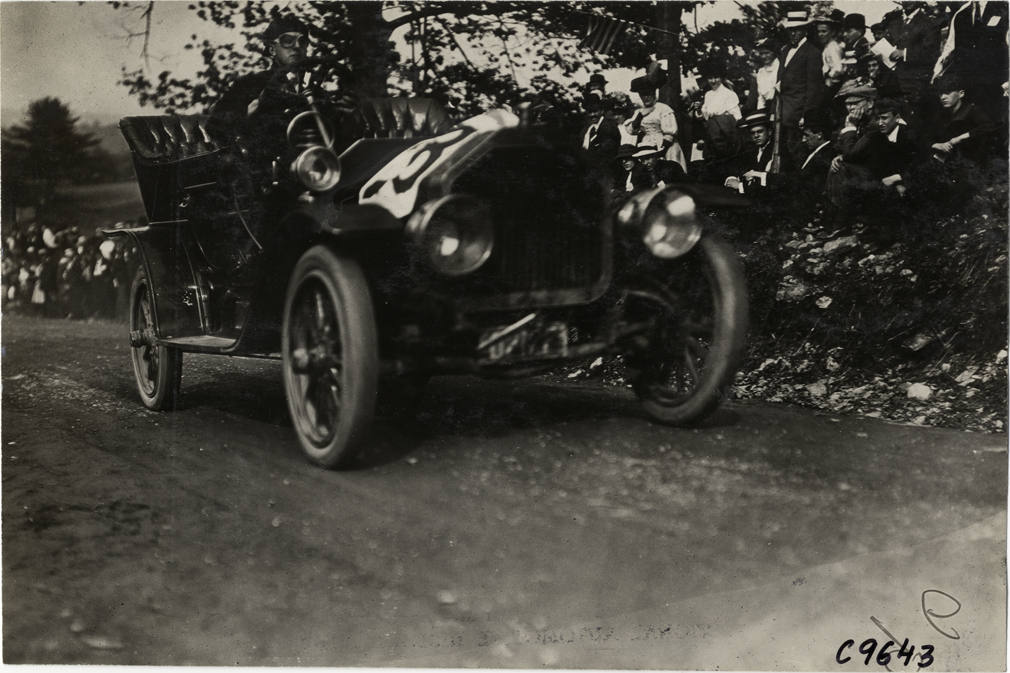 Driver in racecar, 1909 Dead Horse Hill Climb