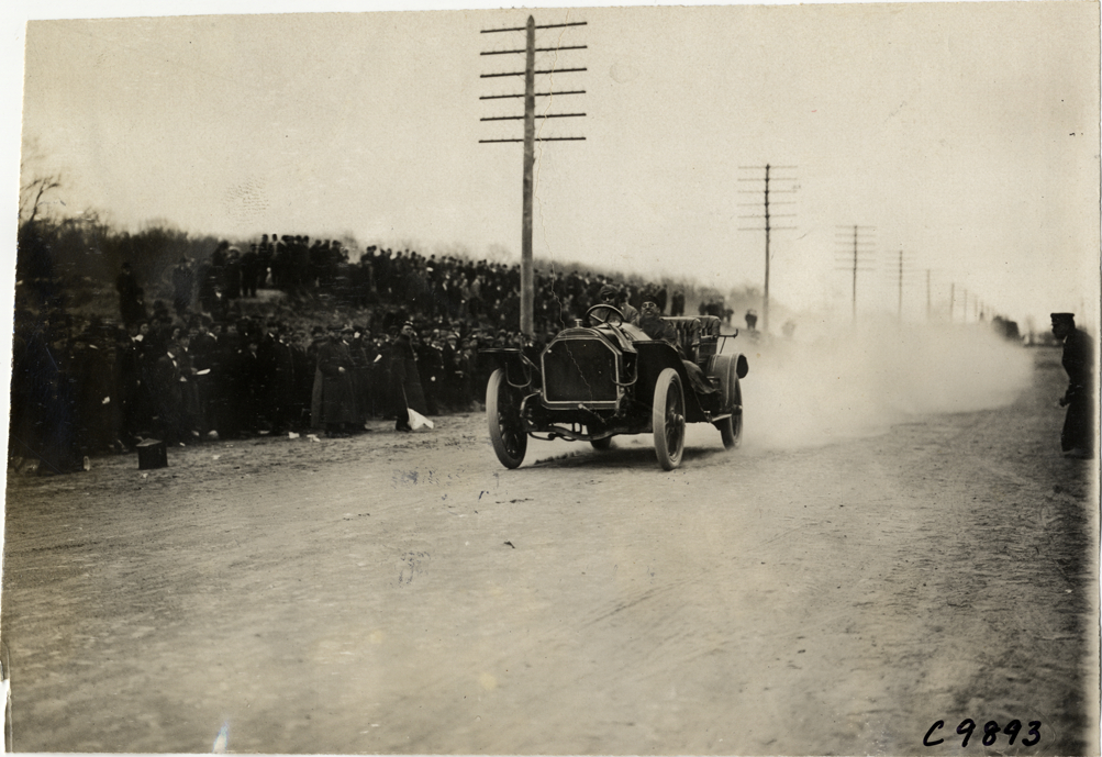 Burke driving Stearns racecar, 1909 Fort George Hill Climb