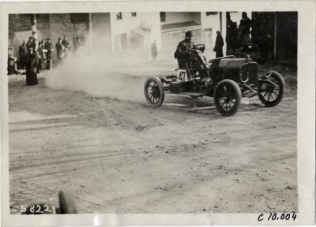 Driver in racecar, 1909 Edgewater-Fort Lee Hill Climb