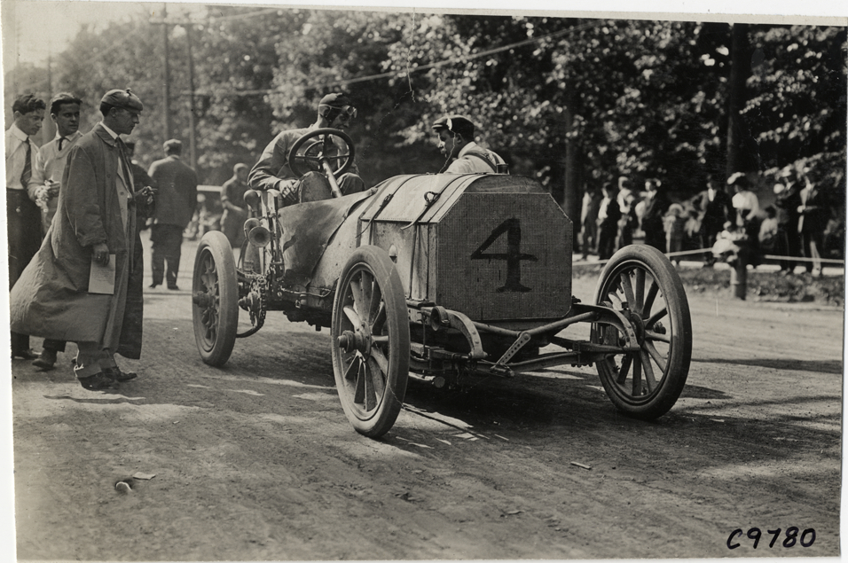 Driver in racecar, 1909 Earlington Hill Climb
