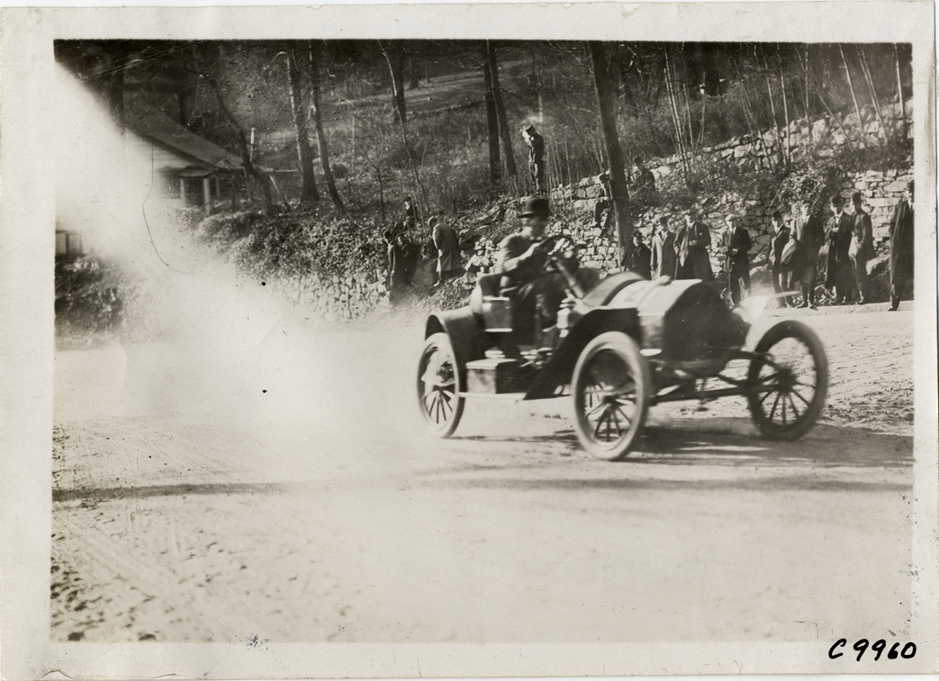 Driver in racecar, 1909 Edgewater-Fort Lee Hill Climb