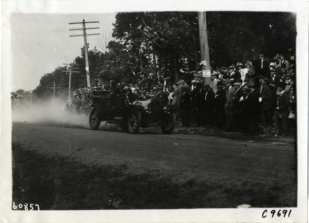Driver in Chalmers-Detroit racecar, 1910 Dead Horse Hill Climb