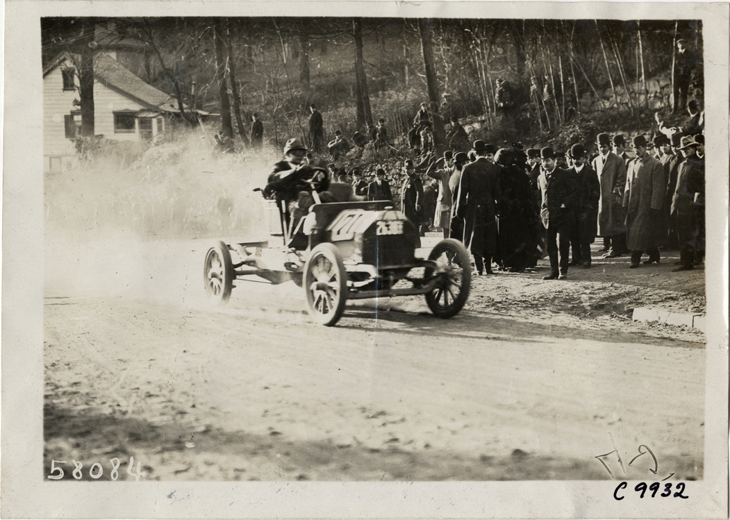 Driver in racecar, 1909 Edgewater-Fort Lee Hill Climb
