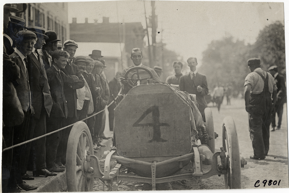 Driver in racecar, 1909 Earlington Hill Climb