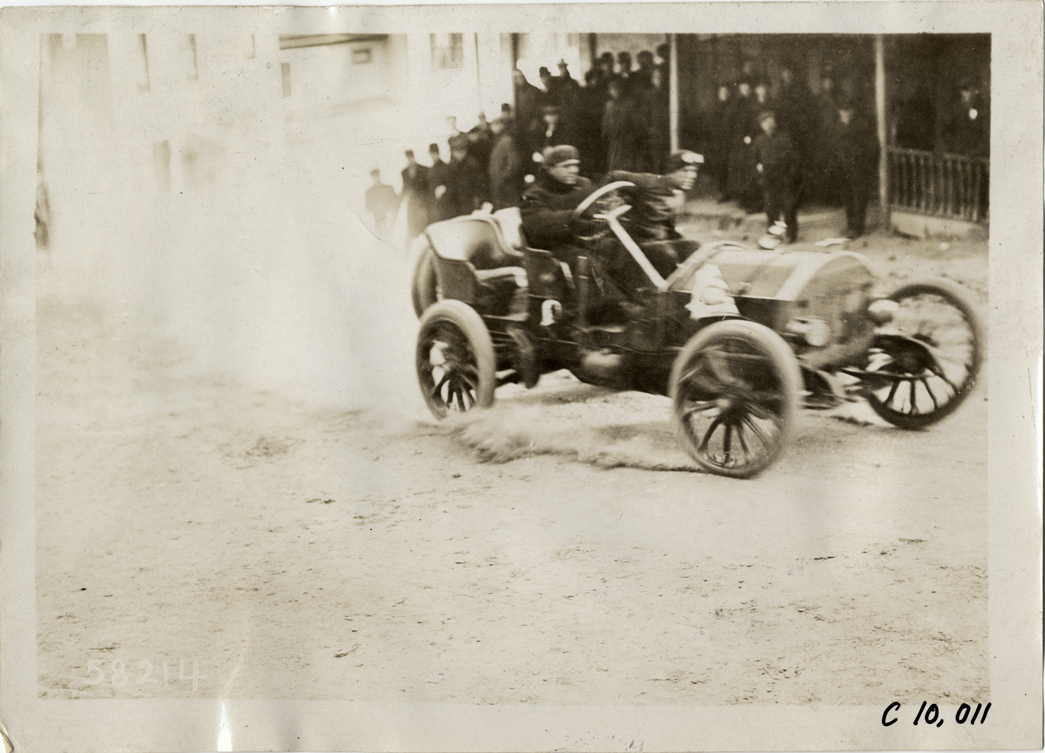 Driver in racecar, 1909 Edgewater-Fort Lee Hill Climb