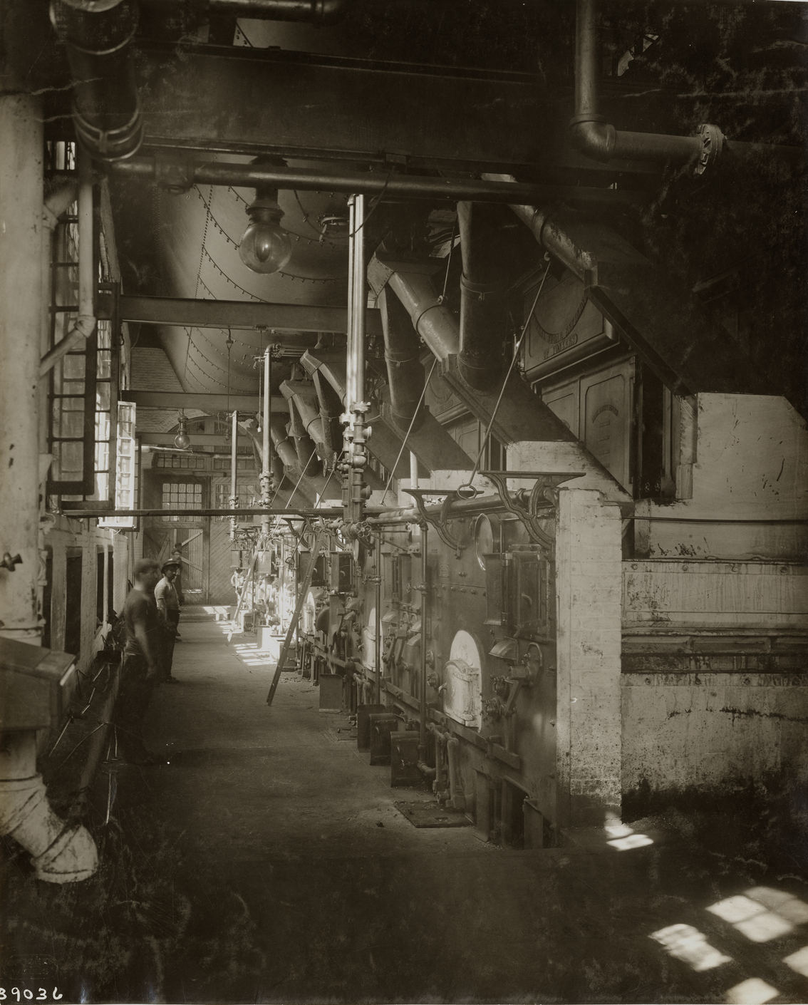 Workers in boiler room