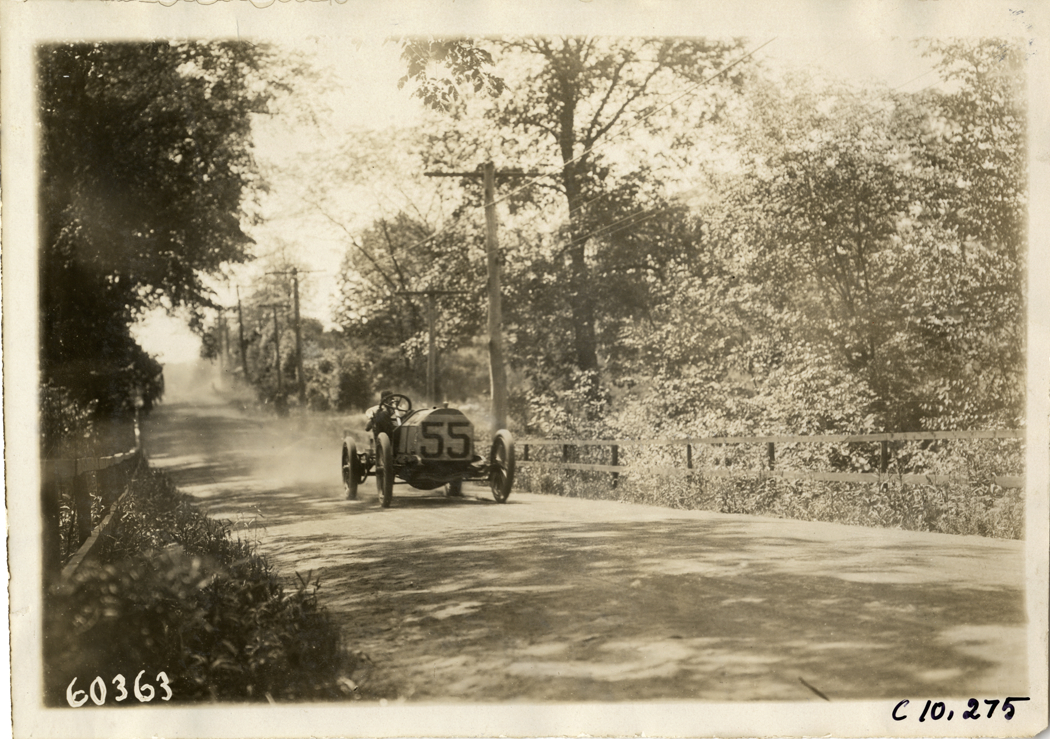 Driver in racecar, 1910 White Plains Hill Climb