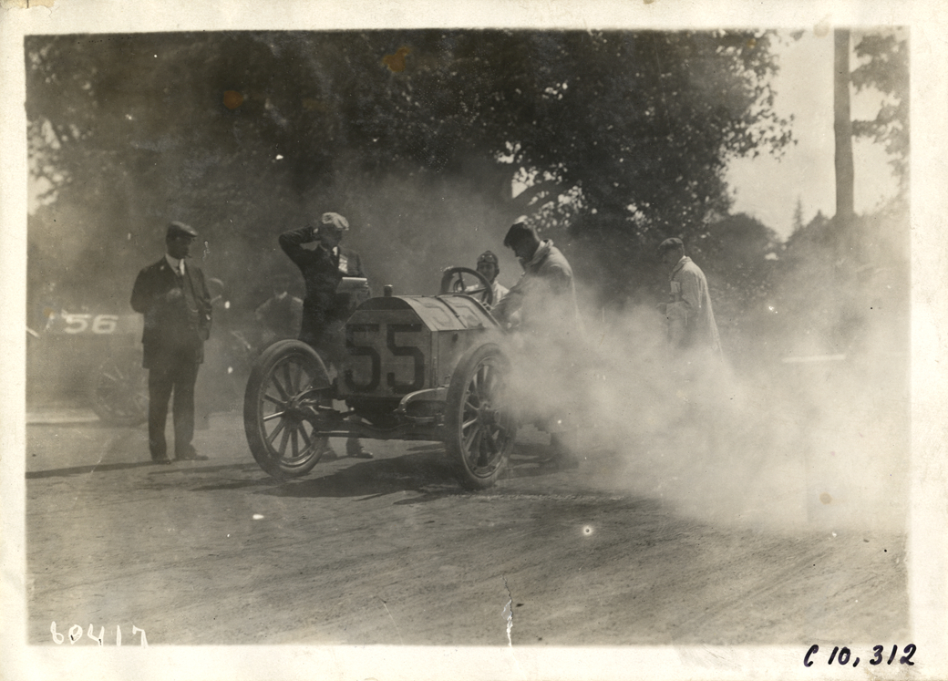 Mechanic checking racecar, 1910 White Plains Hill Climb