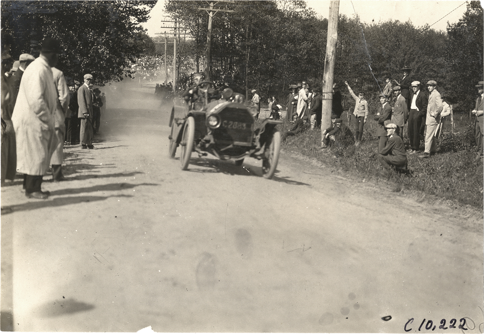 Driver in racecar, 1909 Shingle Hill Climb