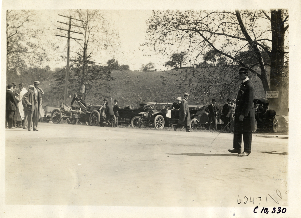 Racecars parked on roadside, 1910 White Plains Hill Climb