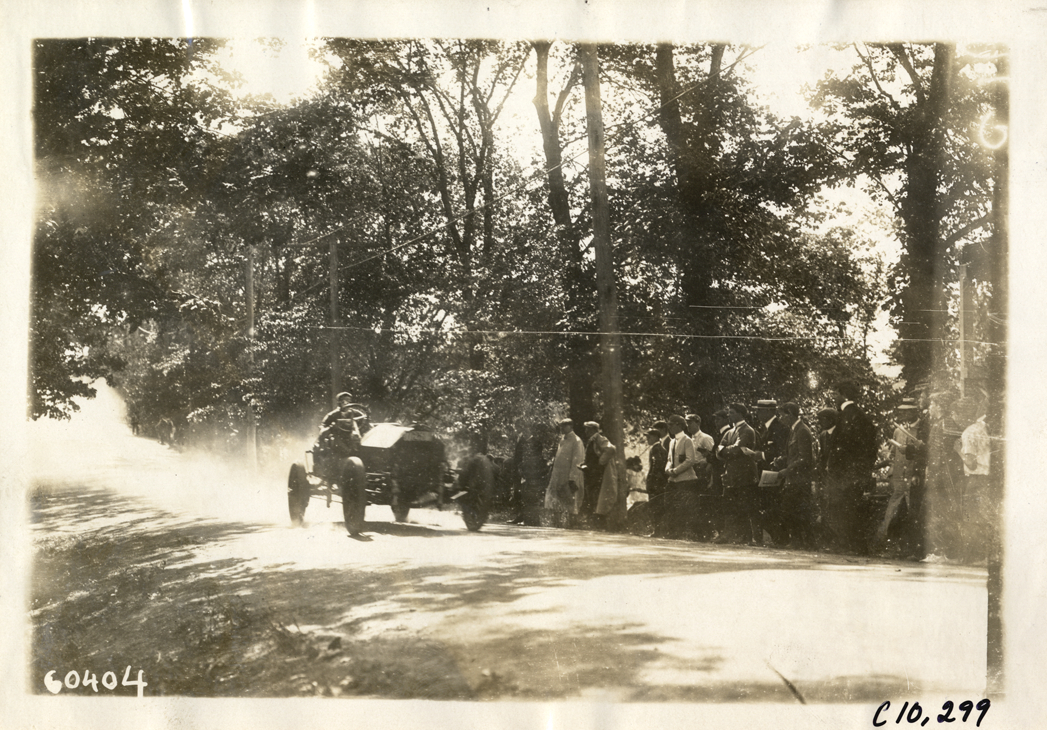 Driver in racecar, 1910 White Plains Hill Climb