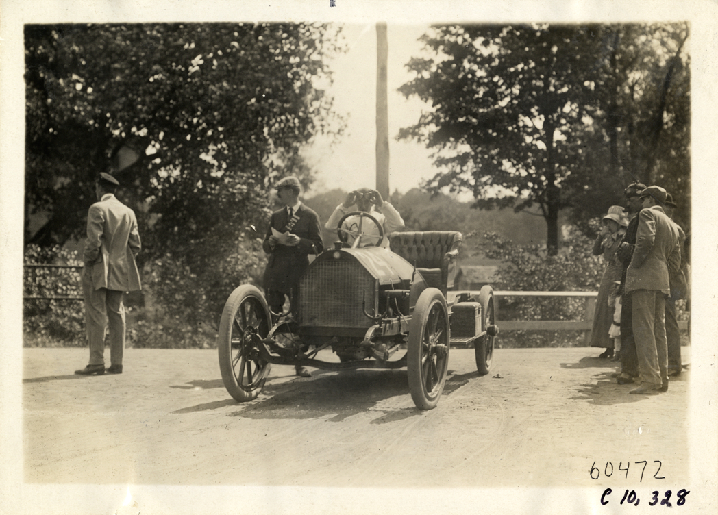 Driver in racecar, 1910 White Plains Hill Climb