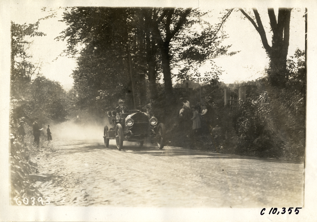 Driver in racecar, 1910 White Plains Hill Climb