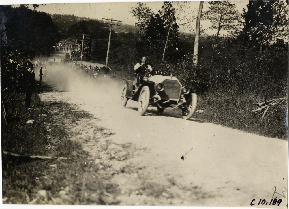 Driver in racecar, 1909 Shingle Hill Climb